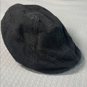 The Dal museum gray cotton paperboy hat with ants embroidered across the back